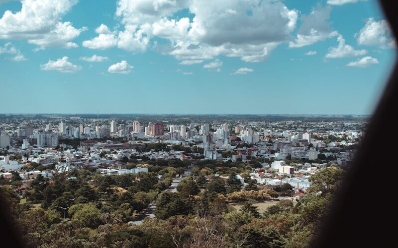 city buildings under blue sky during daytime